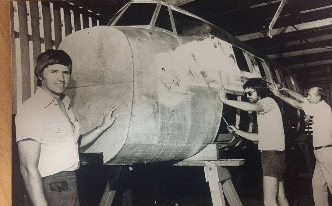 Dr Ben Danneker (left) with the Drover plane in 1978. Also in the photo is Bluey Mangan (right). The man in the middle is not known.