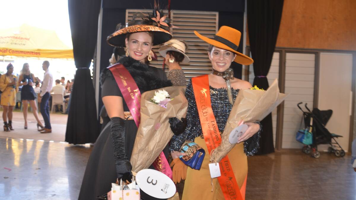 The winner and runner-up in the Mount Isa Cup fashions on the field contemporary ladies category.