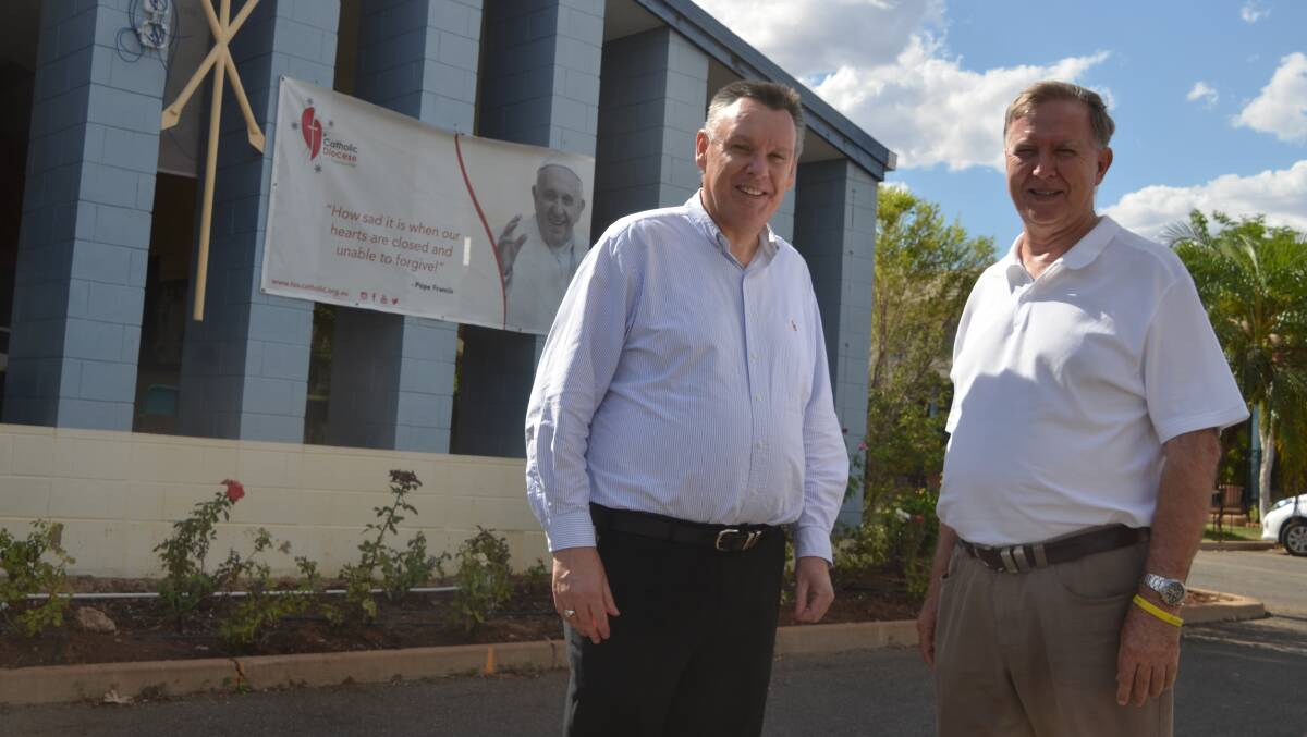 VISIT: Catholic Bishop of Townsville Tim Harris with Fr Mick Lowcock in Mount Isa. Photo: Derek Barry