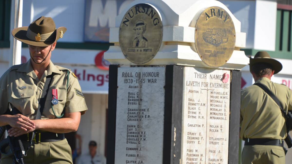 The catalfaque party guards the Cloncurry Cenotaph on Anzac Day. 