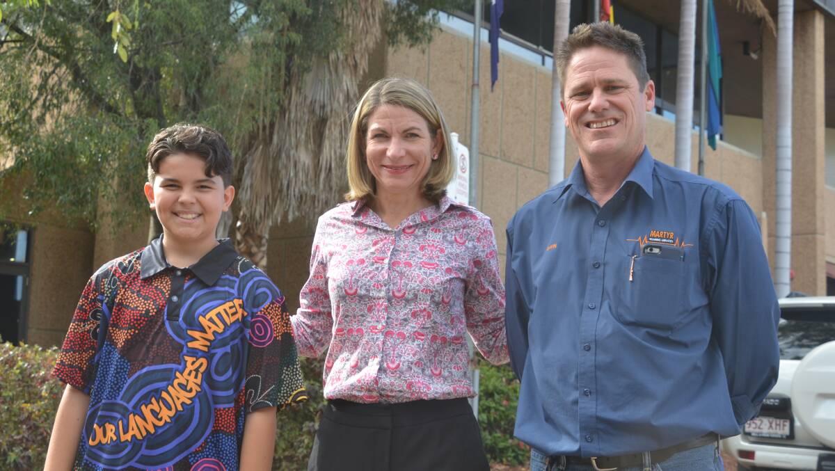BATON BEARERS: Mayor Joyce McCulloch with two of the Mount Isa relayers Mace Te Pohe and Gavin Donnelly. Photo: Derek Barry