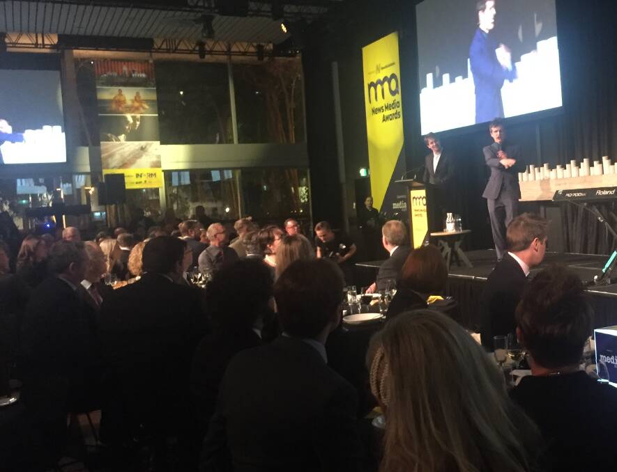 Craig Reucassel and Andrew Hansen on stage at the News Media awards in Sydney on Tuesday.