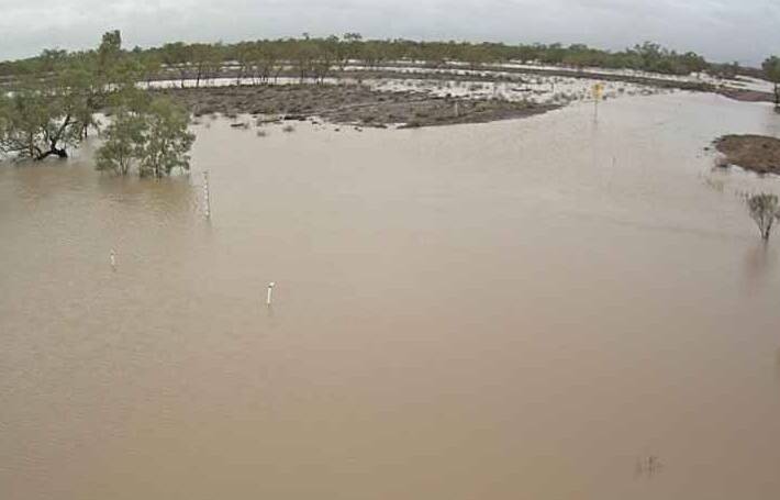 This photo of the Diamantina River was taken Thursday morning and it is likely it has risen further since then stranding people near Middleton.