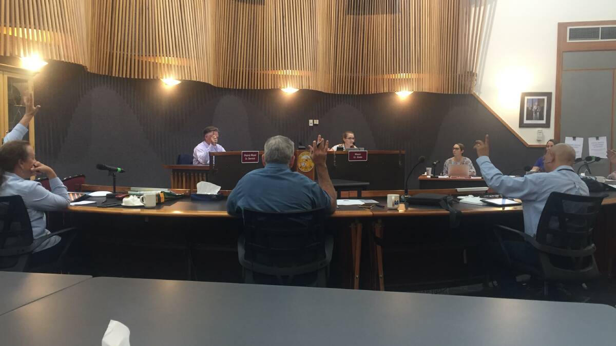 Councillors vote to pass a recording Council meeting policy on Wednesday.
