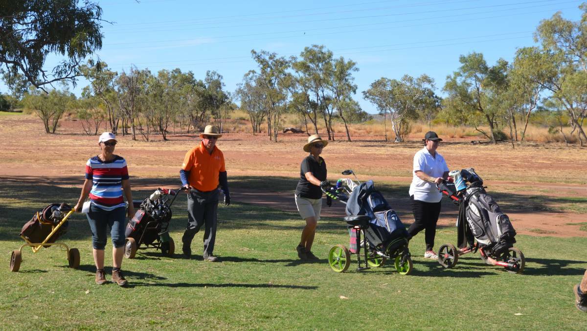 Competitors take part in the Outback Golf Masters at Mount Isa in 2019.