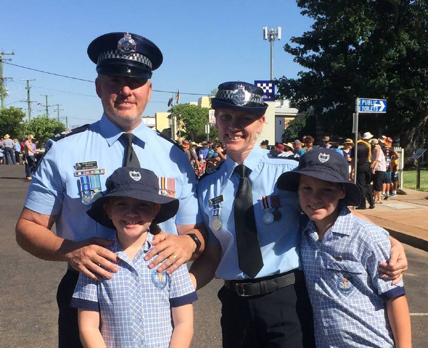 COMMUNITY MINDED: Brad and Heidi Rix with their children Cleo, 10 and Vin 11.on Anzac Day. Photo:supplied
