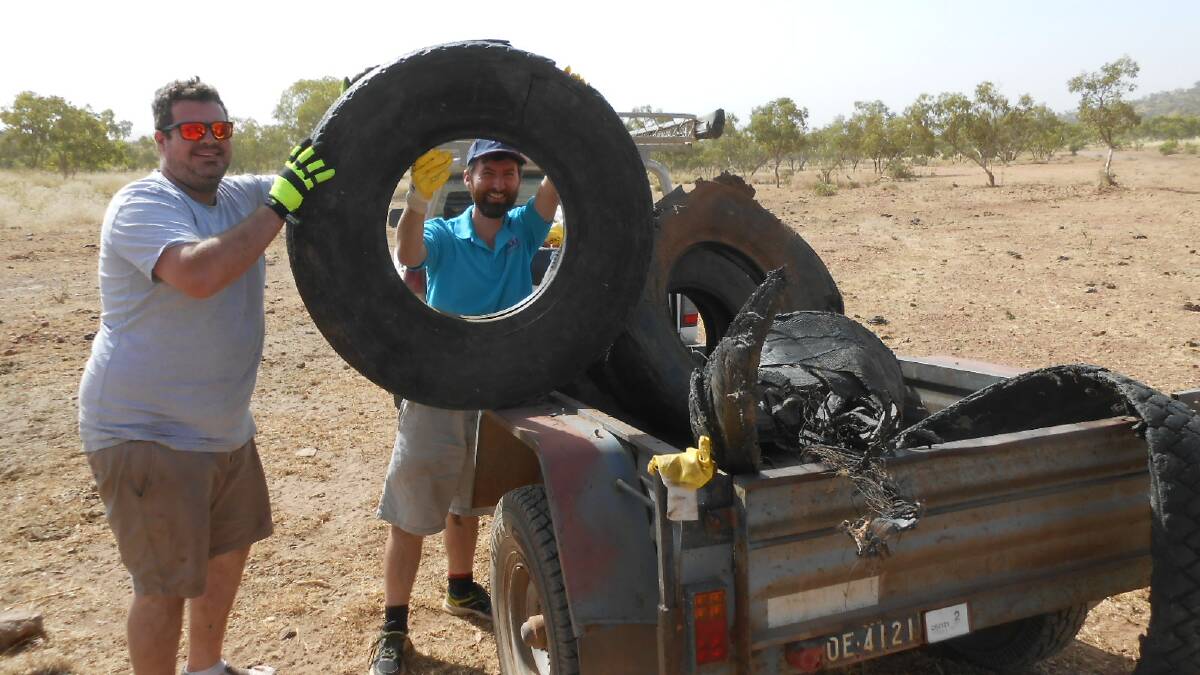 Landcare volunteers pick up old tyres on the Ballara Mining Trail.