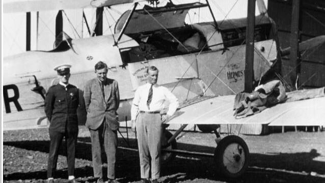 QANTAS Plane Hermes at Cloncurry. L:R: Ambulance Officer Jack Lisson; Dr. George Simpson; Pilot Mr. Evans. Photo: National Library of Australia.