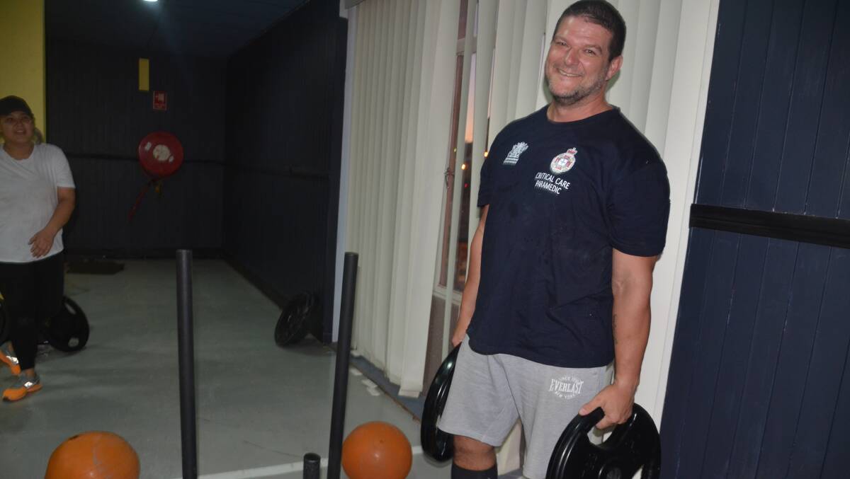 Scott Jones gets ready for some weight training at Mount Isa Strongman on Tuesday.