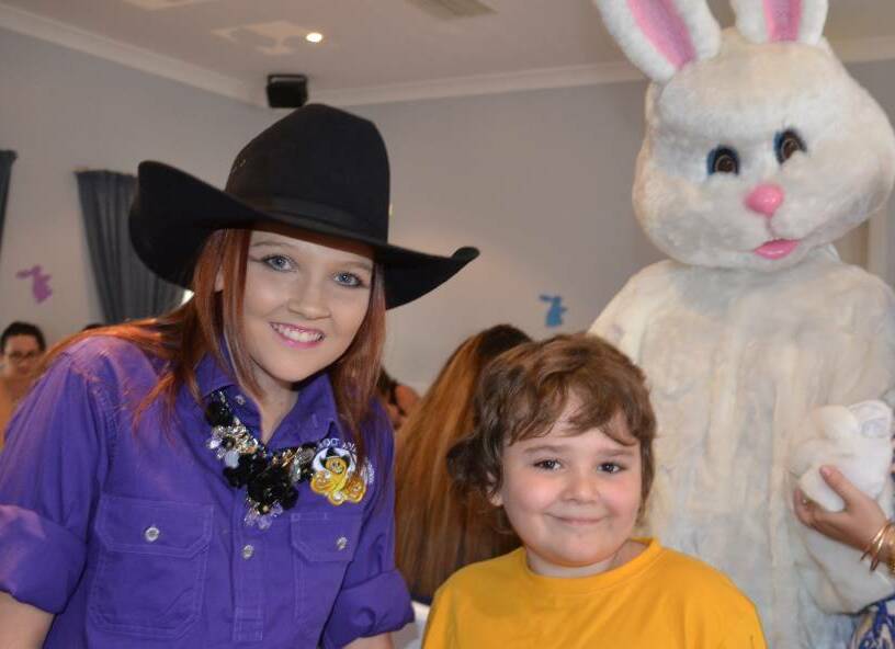 Keely Johnson with Kael Lovelock and the Easter Bunny in Mount Isa in 2016.