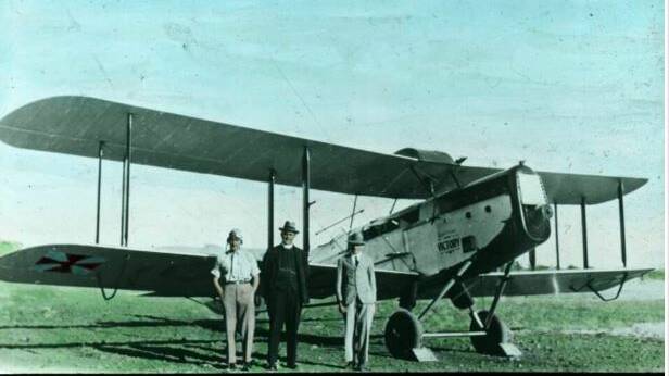 A. Affleck, Pilot; Rev. JA Barber; Dr. G. Simpson.QANTAS VICTORY. Photo: National Library of Australia.