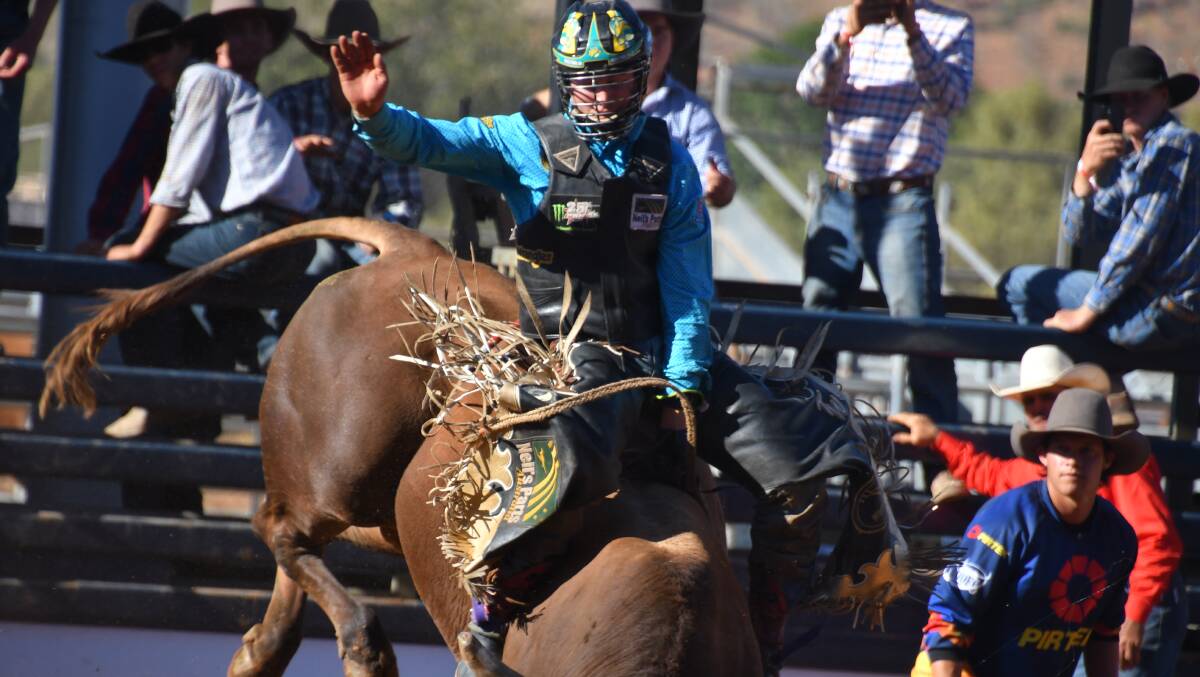 TOP NOTCH: Troy Wilkinson with the winning ride in the open bull ride. Photo: Derek Barry