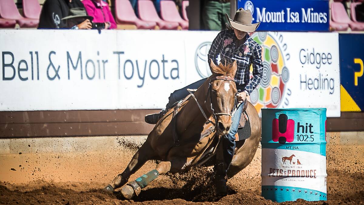 Chantel Huddy and her 19-year-old gelding Mick won the barrel racing competition at Mount Isa Mines Rodeo. Photo: Stephen Mowbray Photography.