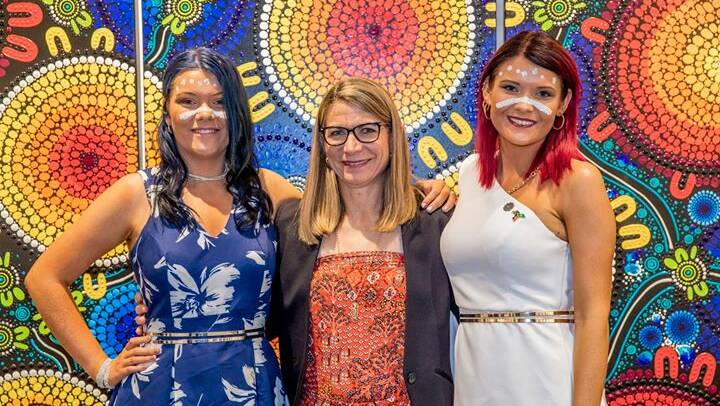 The Sutton sisters, Brooke (left) and Chern'ee (right) with Mayor Joyce McCulloch at their exhibition Two Kalkadoon Sisters.