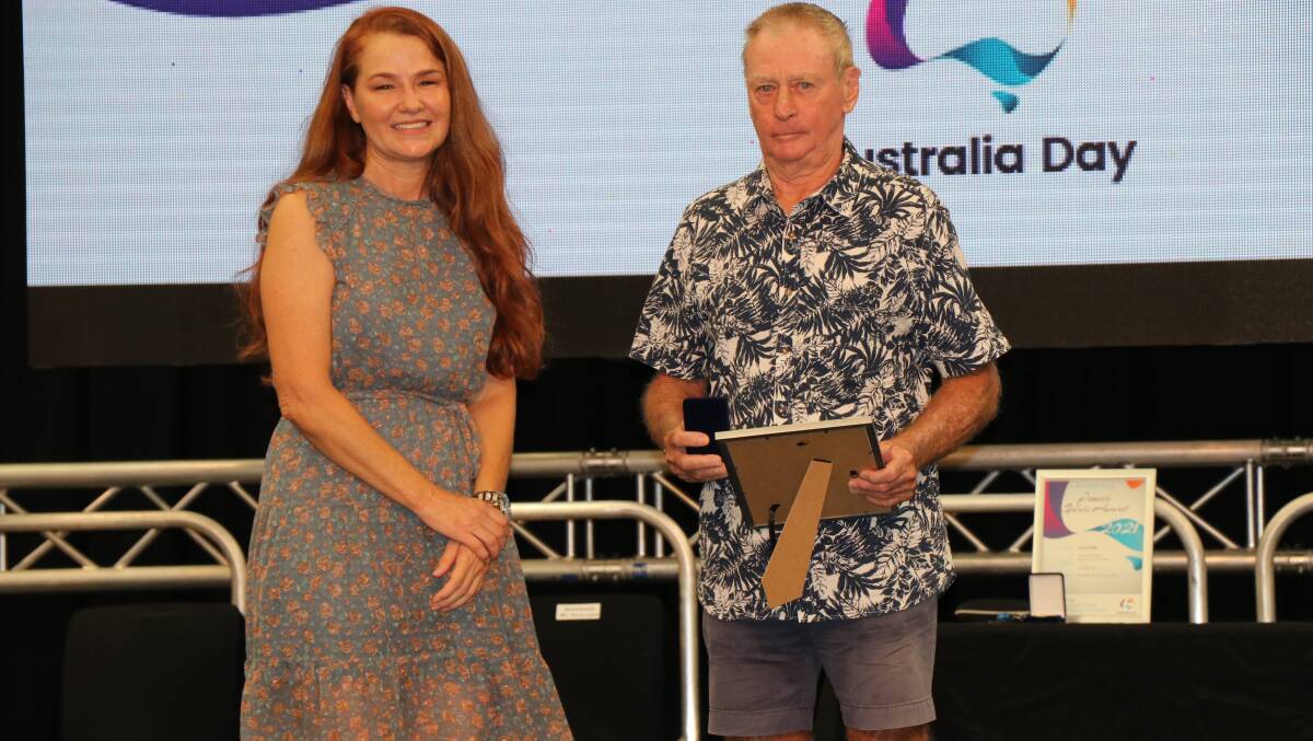 Bob Jakeman receives his 2021 Mount Isa Citizen of the year award from Mayor Danielle Slade. Nominations are now open for the 2022 awards.