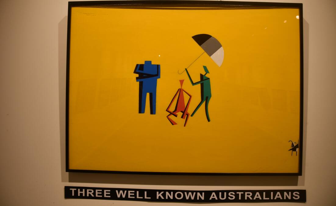 A headless figure in blue, a sitting person in red and a green figure with a brolly are, collectively, the "Three Well Known Australians" currently at the Outback at Isa gallery.