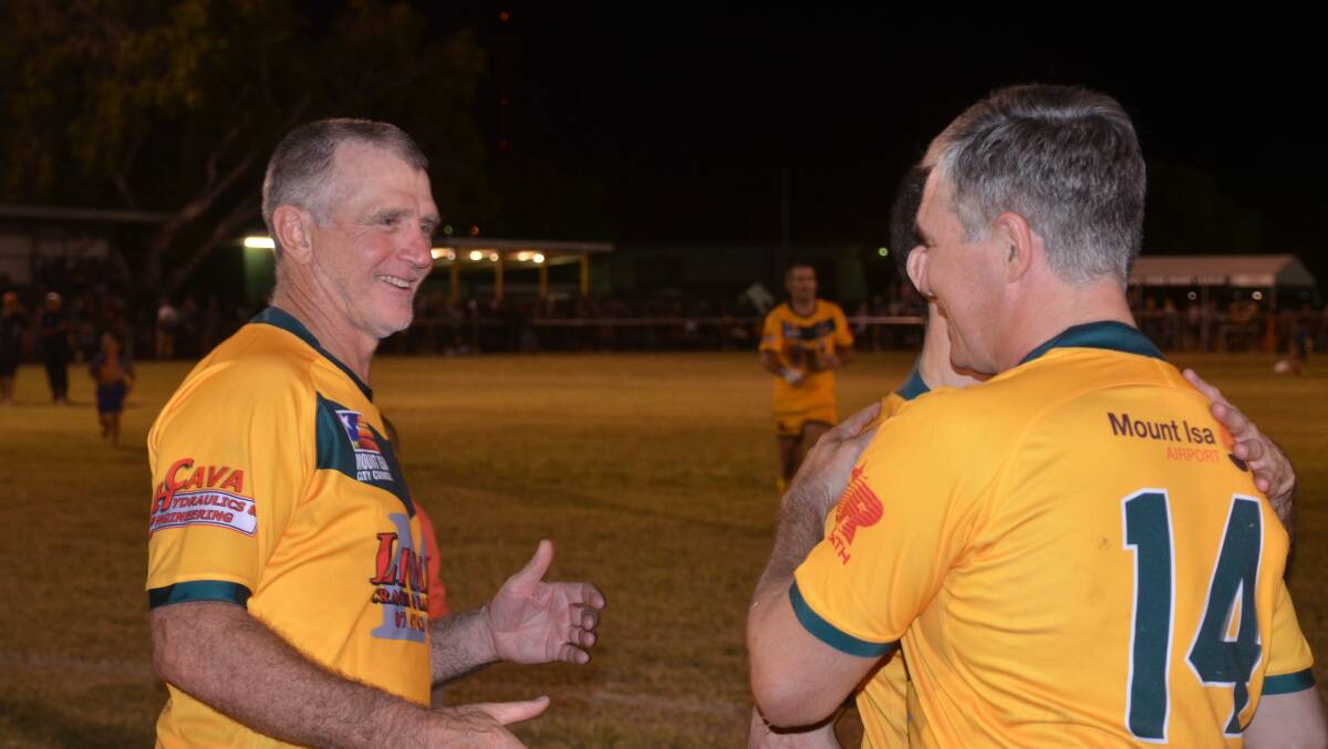 Mal MacRae and Robbie Katter share a moment after the Legends of League game.