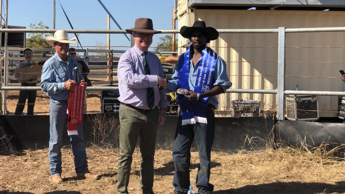 WESTERN WEAR: Governor de Jersey hands out a winner's sash at the Burketown Rodeo last weekend. Photos: contributed