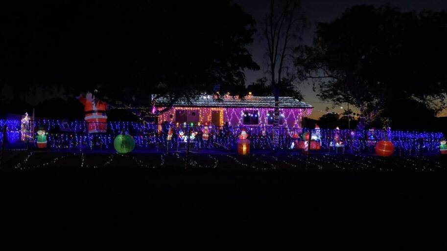The Pages of 51 Clarke St are using their Christmas lights to donate to charity.