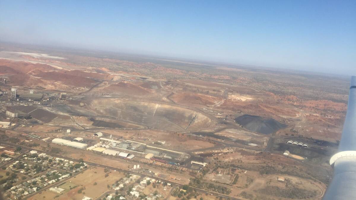 NORTH BY NORTHWEST: Another beautiful cloudless day looking west over Mount Isa Mines while taking off from Mount Isa Airport. Photo: Derek Barry