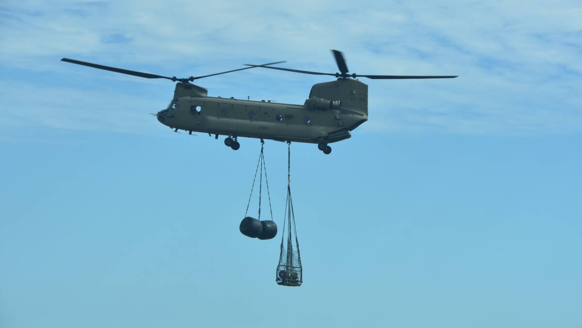 HELP: Army helicopters make fodder drops across the region. Photo: Samantha Walton