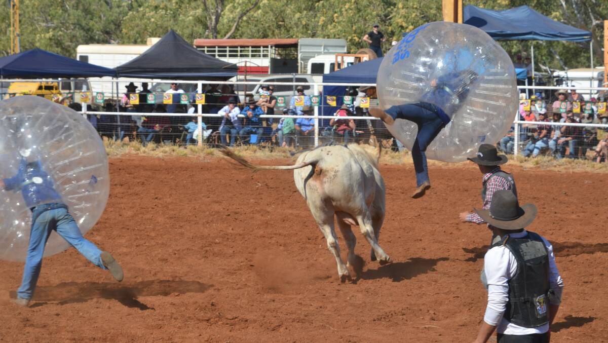 UP THERE CAZALY: Bush rodeo visitors got to see how bubble soccer is played, Quamby style. Photo: Derek Barry