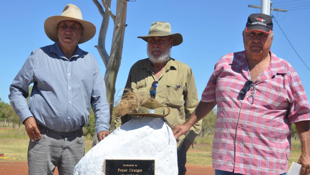 Peter Craigie's son Terry Craigie and grandsons Tom Simmons and Joe Rogers at the Dajarra Anzac memorial opening on Tuesday.