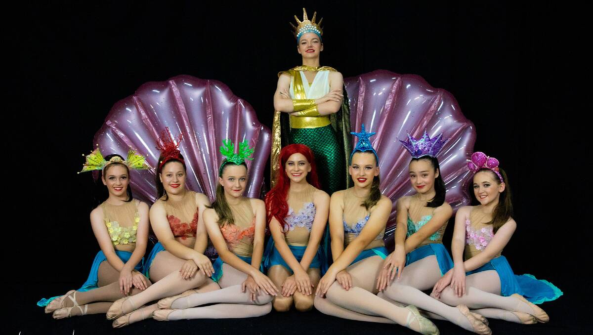 King Triton (played by Jade King) and his daughters - Left to Right: Adella (Rose Elliott), Arista (Sophie Papadopoulos), Attina (Violet Pye), Ariel (Amity Fietz), Aquata (Charlotte Rogers), Alana (Maddie McKeown), Andrina (Hayley Winks) Photo: Leonie Winks.