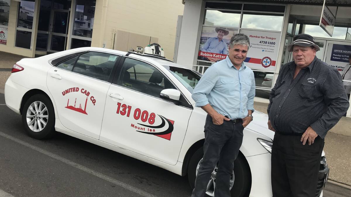 Robbie Katter with Mount Isa United Cab taxi driver Glen Corliss in 2018
