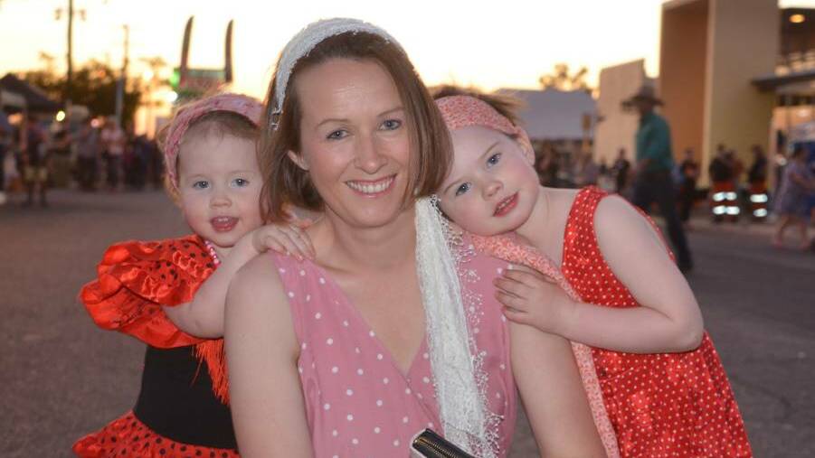 Mum Jill Smith with Emily, 2 and Audrey, 4 enjoy the 2019 Cloncurry Beat the Heat festival.