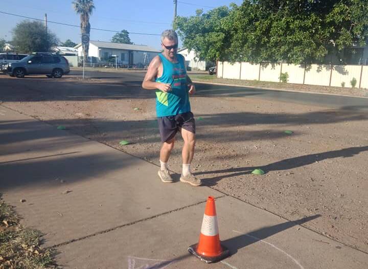 KEEP GOING: Parkrun's snapper catches our editor panting at Saturday's turnaround point. Photo: Mount Isa parkrun Facebook page