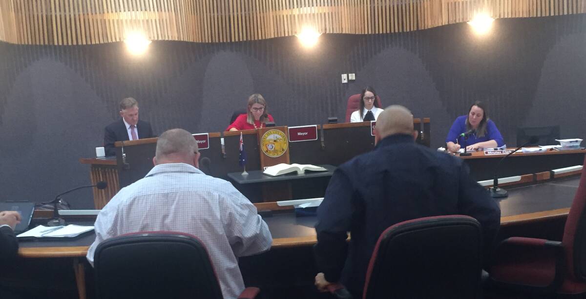 Mayor Joyce McCulloch hands down the budget on Wednesday.