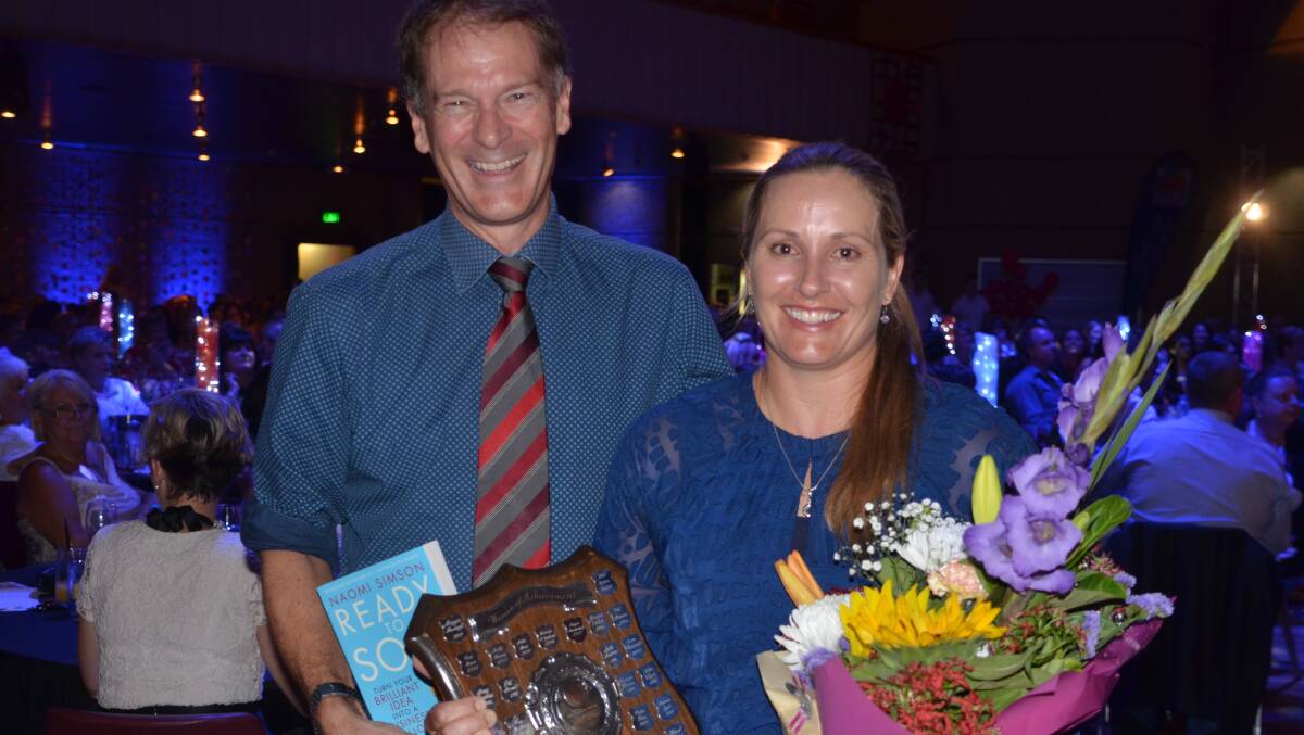 WINNER: Southern Gulf NRM CEO Andrew McLean who nominated Megan Munchenberg for the woman of achievement award congratulates her on the award. Photo: Derek Barry
