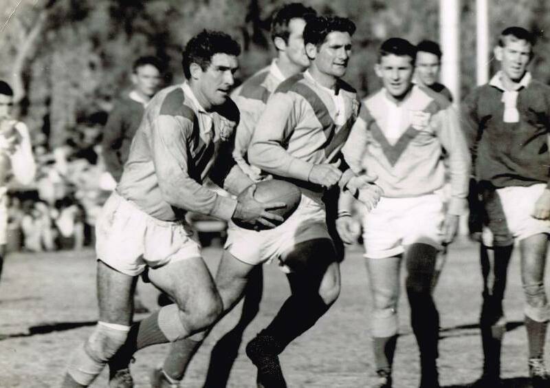THROWBACK: Terry Hammond with the ball in Mount Isa's first Foley Shield victory in 1969.