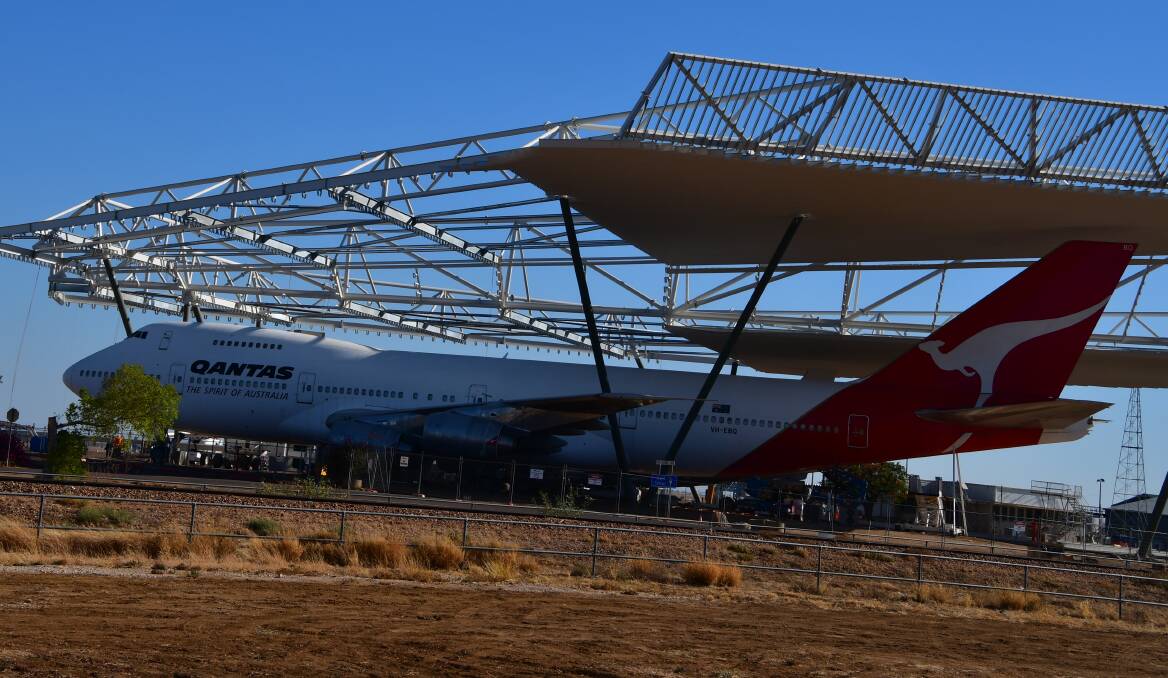 LONG REACH: Work continues on Longreach Qantas Founders Museum's $11.3 million project to put a roof cover over the Museums aircraft. Photo: Derek Barry