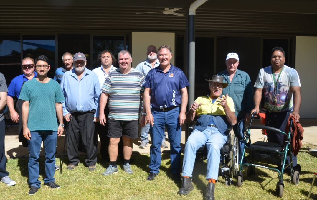 MEN'S BUSINESS: Visitors attend the launch of the Mates Men's Shed at the Mount Isa Neighbourhood Centre on Saturday. Photo: Derek Barry