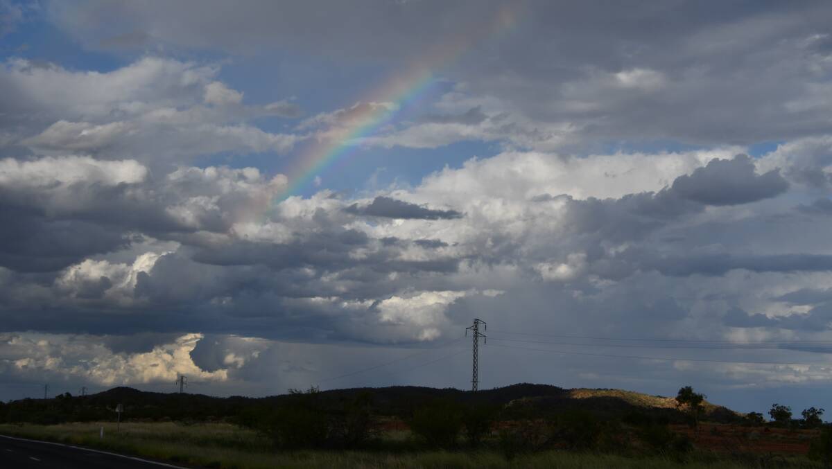 CLEANSING SIGHT: A partial rainbow seen on the road between Mount Isa and Cloncurry. Photo: Derek Barry