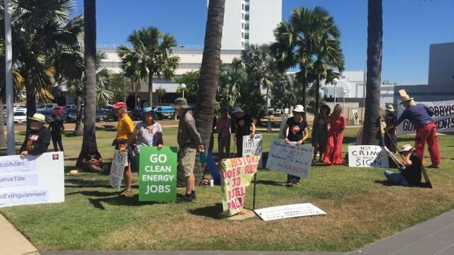 Protesters outside the sitting of parliament in Townsville this week.