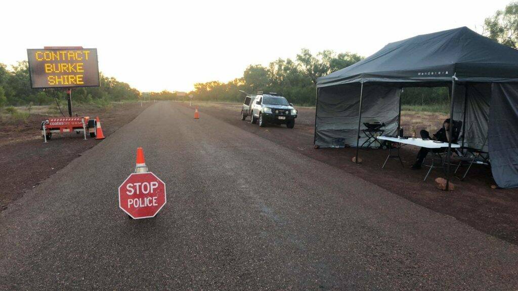 Queensland police patrol Savannah Way border crossing to NT.
