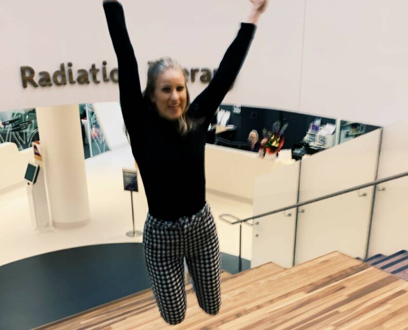 Jumping for joy after completing radiation.