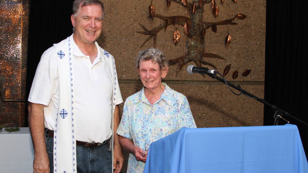 Reverend Betty Handley with  Father Mick Lowcock at a Prayer for Rain ceremony in Mount Isa.