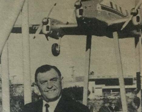 Mayor Franz Born unveils the plane in George McCoy Park in 1980.