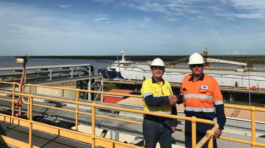 New Century Port Manager Greg OShea (right) and Carpentaria Shire Councillor Peter Wells,with the MV Wunma containing the 500,000th zinc concentrate tonne produced.