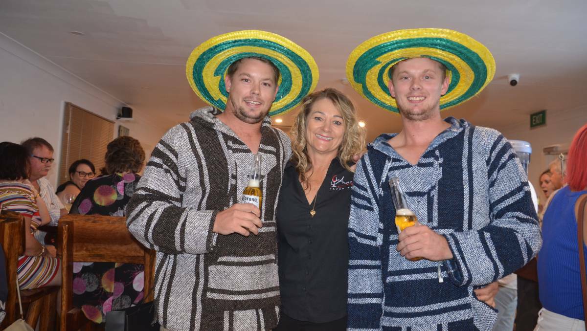 Deb Howie and her sons in happier times for Arvos Tapas Bar on its opening night in 2018.