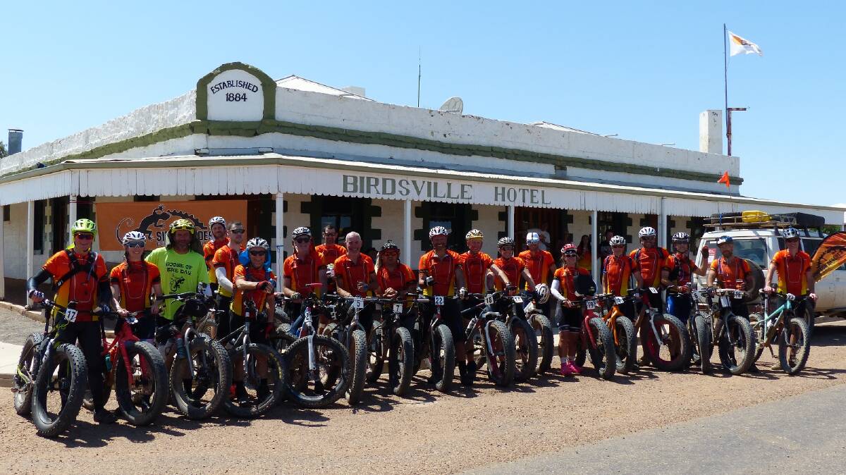 Cyclists in the Simpson Desert Cycle Challenge set off from Birdsville.