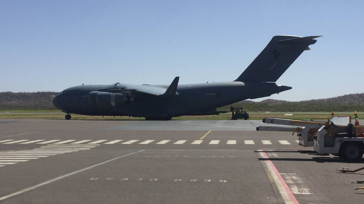 Jet fuel is unloaded off an RAAF C27 at Mount Isa on Sunday.