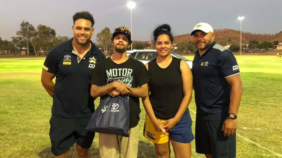 NWHHS invited Mount Isa residents to Sunset Oval on Tuesday night for a "jab and a snag" with Cowboys footy legends Matty Bowen (right) and Antonio Winterstein (left). Photo NWHHS
