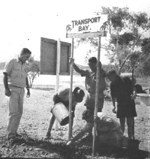 The sign goes up to mark the new Leichhardt Dam in 1960.