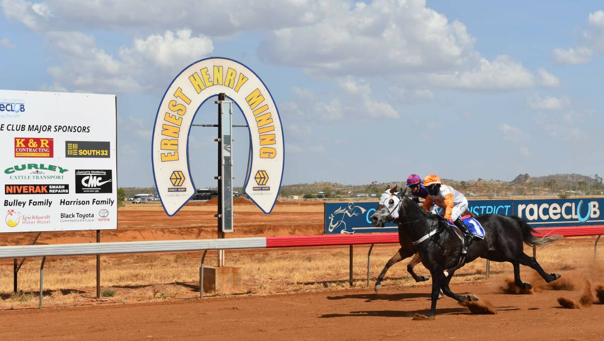 CLOSE ONE: Yarrapower (1) edges past Wicked Wiki to win Race 3 at Cloncurry. Photo: Derek Barry