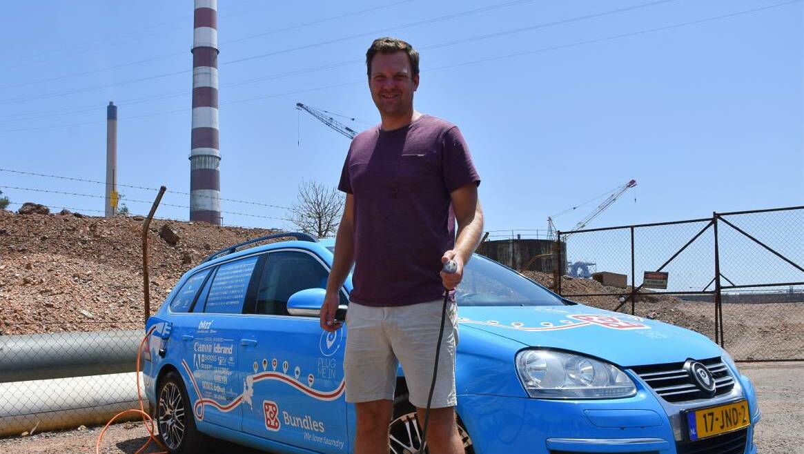 Dutch electric car adventurer Wiebe Wakker, seen here in Mount Isa, has arrived in Adelaide.